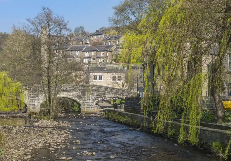 Stone bridge over river in Hebden Bridge West Yorkshire, budget-friendly UK destination