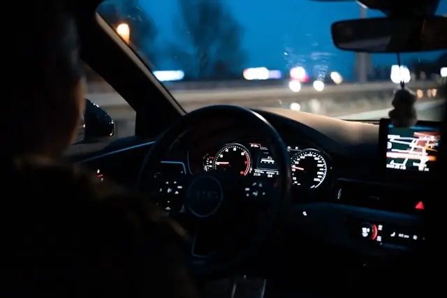 Night driving on UAE highways with proper headlights and safety precautions