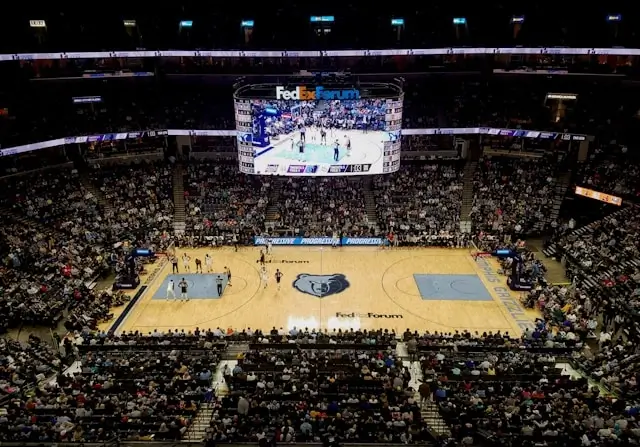 FedExForum arena packed with fans during Memphis Grizzlies game with jumbotron and court view