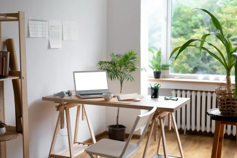 Minimalist home office desk setup with plants and natural light for productive workspace gift upgrades