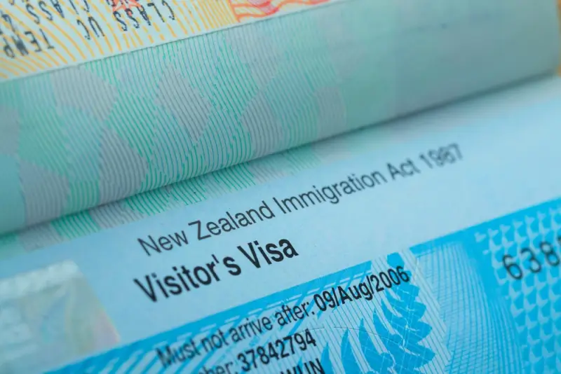 Close-up of New Zealand Immigration Act visitor's visa document with security features