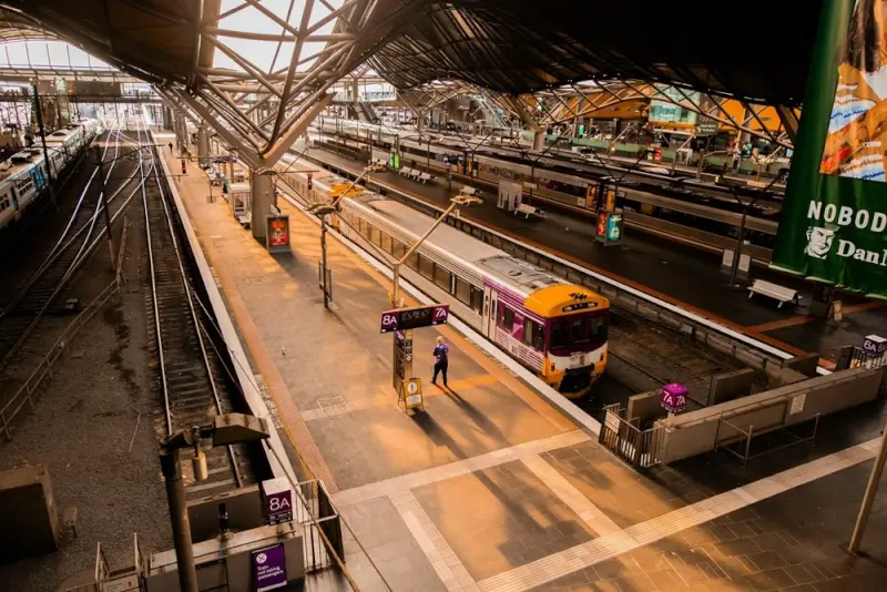 Southern Cross Station platforms in Melbourne with storage facilities for travelers nearby