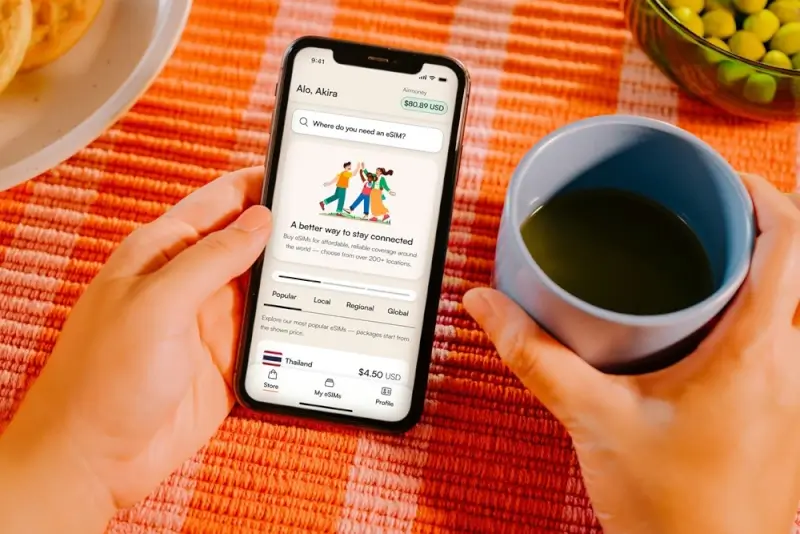 Browsing eSIM data plans for Bali and Indonesia travel on smartphone