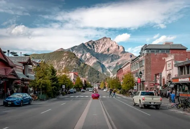 Canada road trip through Banff town with mountain backdrop and main street view