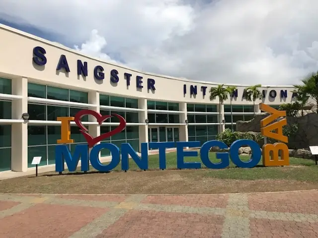 Sangster International Airport entrance with I Love Montego Bay sign in Jamaica