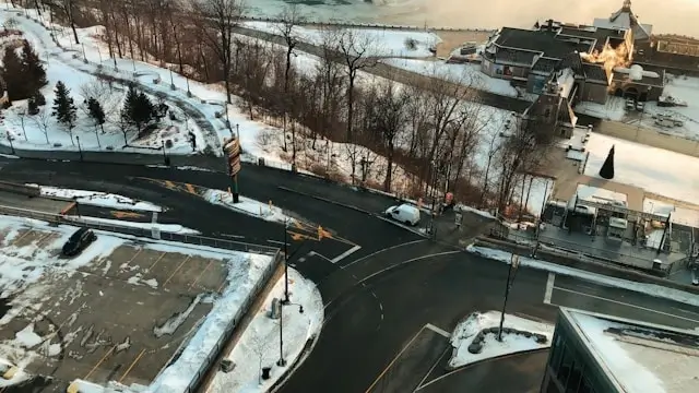 Snowy highway intersection in Canada during winter driving conditions