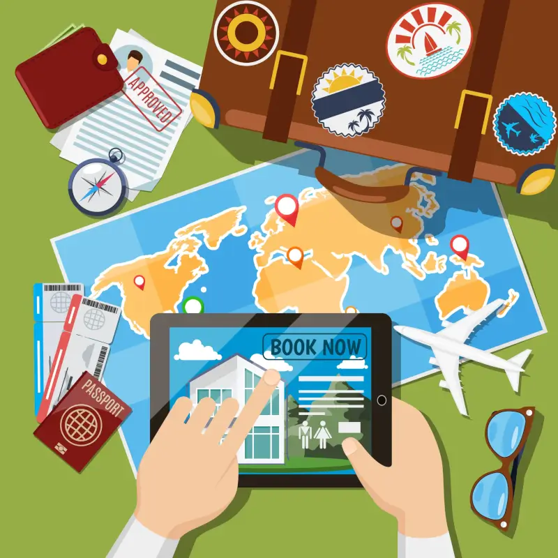 Traveler booking accommodations on tablet with world map, passport, tickets, and travel planning essentials