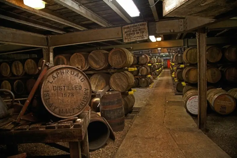Laphroaig 1978 Islay malt whisky barrel in a traditional Scottish distillery maturation warehouse