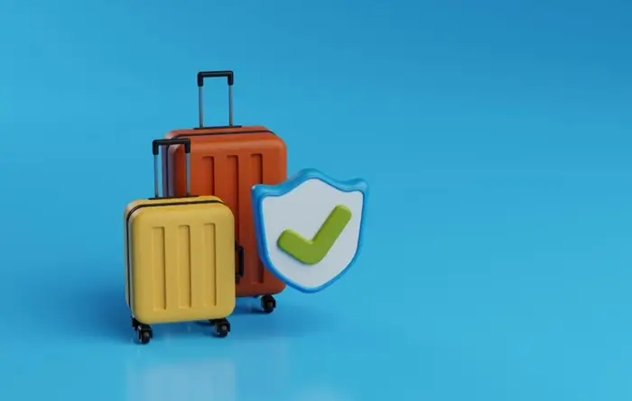 baggage delay protection concept with two suitcases and a shield icon on blue background