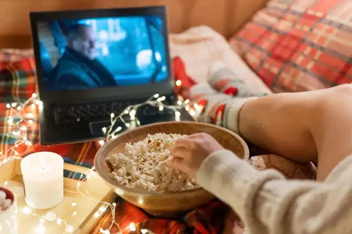 cheap things to do at home for the weekend binge watching movies with popcorn