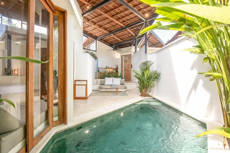 Bright tropical villa with a private plunge pool and wooden ceiling from Homes and Villas by Marriott Bonvoy