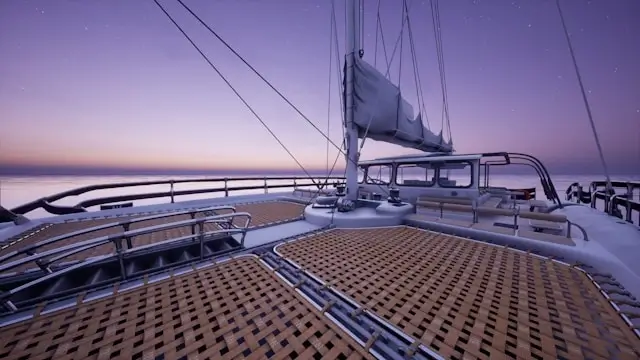 Deck of a hybrid sailing vessel at dusk with a calm sea and purple twilight sky
