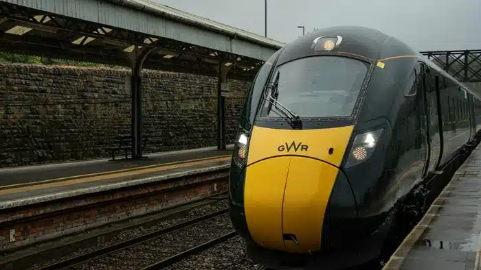 A GWR train pulled up at Truro railway station on a rainy day