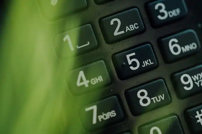 Close-up of a phone keypad showing how to get a Canadian phone number from abroad