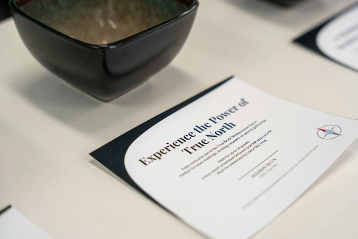 Close-up of a hotel gift certificate on a white table, a flexible travel gifting option