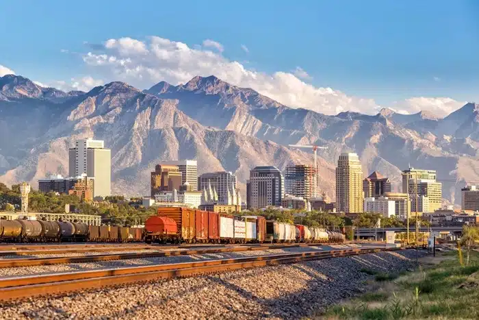 salt lake city train tour with downtown skyline and Wasatch Mountains in the background