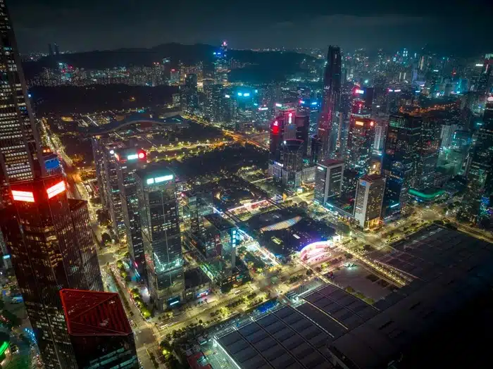 Aerial night view of Futian CBD skyscrapers and city lights in Shenzhen