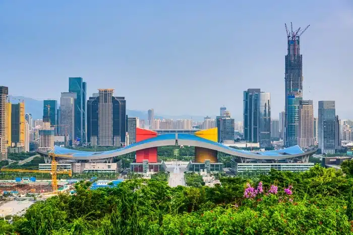 Business travel in Shenzhen: daytime skyline view of the city's CBD towers and convention center