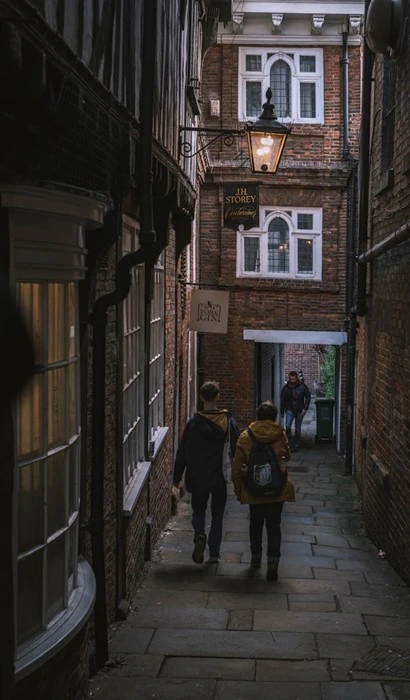 travelers walking around with backpack