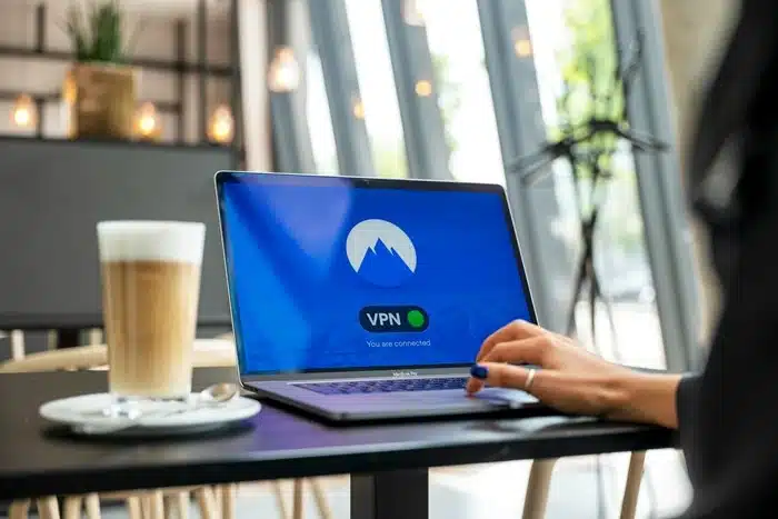 Traveler connecting to a VPN on a laptop while working remotely in China
