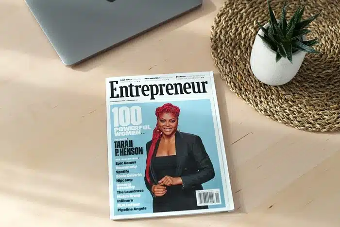 Entrepreneur magazine on desk featuring inspiring business leaders and success stories
