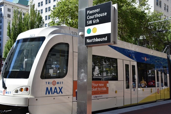 MAX Light Rail stop at Pioneer Courthouse Square, a convenient transit option for traveling to Portland, Oregon