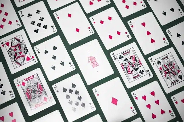 Deck of playing cards laid out for a game of solitaire, a popular flight travel game