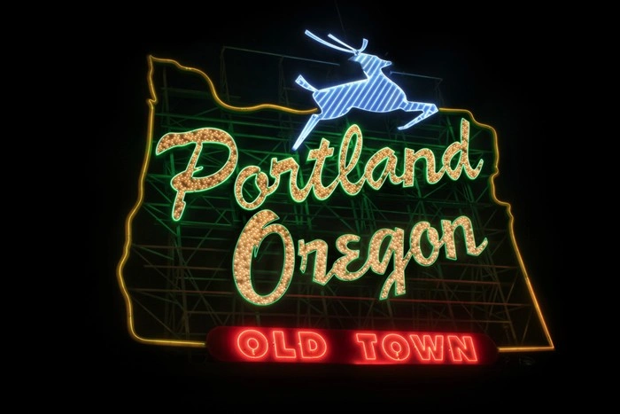 Iconic Portland, Oregon Old Town neon sign lit up at night
