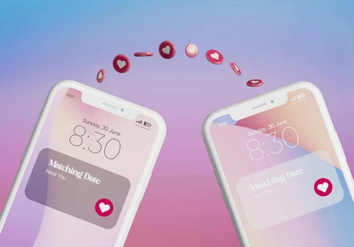 Two smartphones showing a matching date notification for online dating