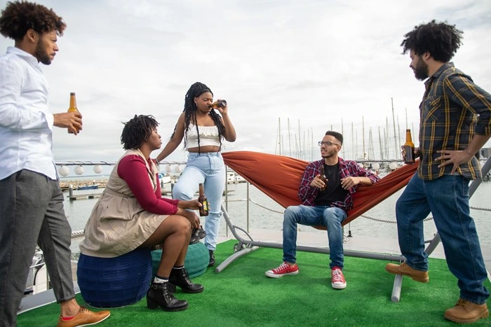 Group of friends bonding and connecting at an outdoor social dating mixer