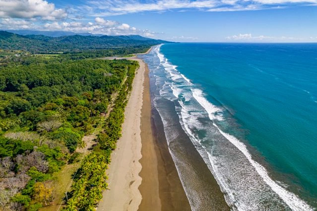 Aerial view of unspoiled coastline and rainforest along the Costa Rica coast