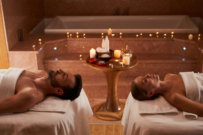 Couple relaxing together during a luxury spa massage getaway