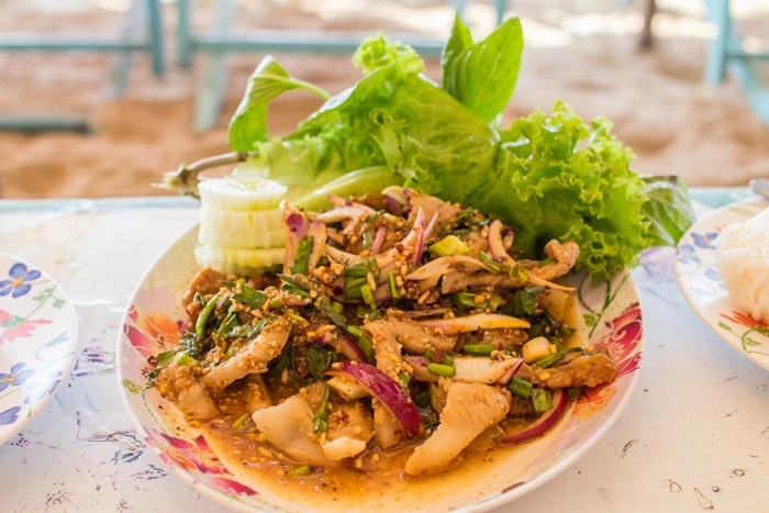 Fresh herb-forward Thai dish with lettuce and cucumber, part of Pattaya's healthy dining scene