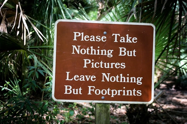 How responsible travel starts with a simple park sign reminder