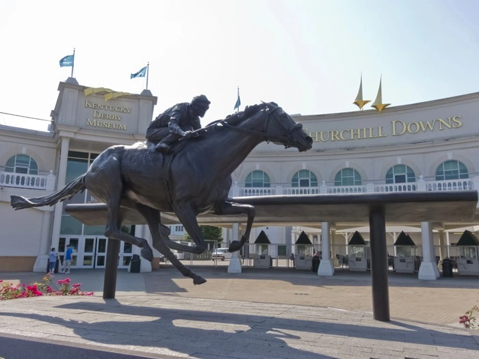 Jockey and racehorse statue outside Churchill Downs and the Kentucky Derby Museum in Louisville
