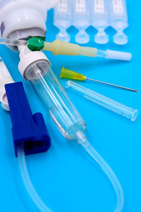 Implantable port device components and needle laid out for medical injury documentation