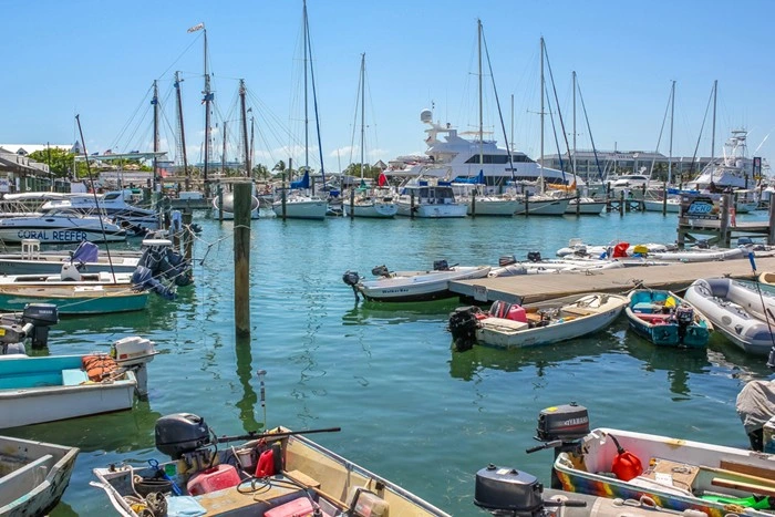 Motor and sailing boats docked at a Key West marina