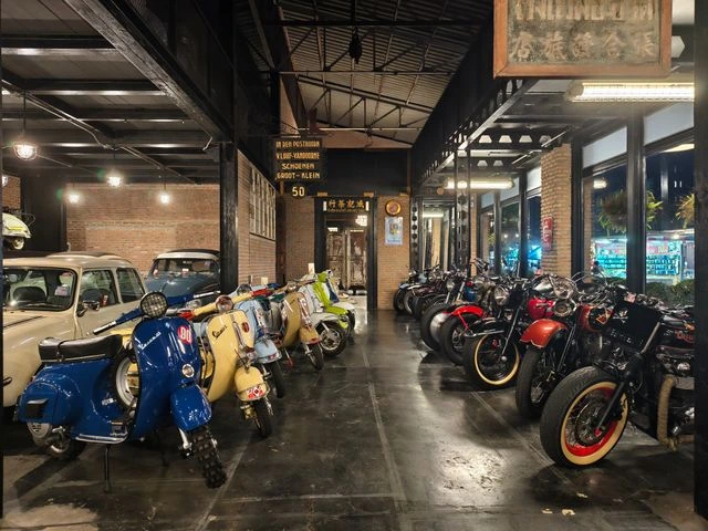 Row of parked scooters and motorcycles, alternative transportation options for a suspended license