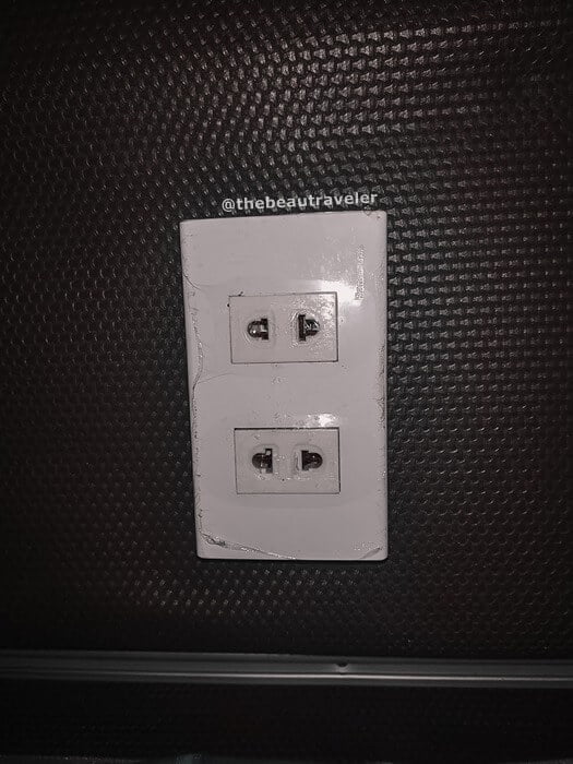 The electricity socket at the bus.