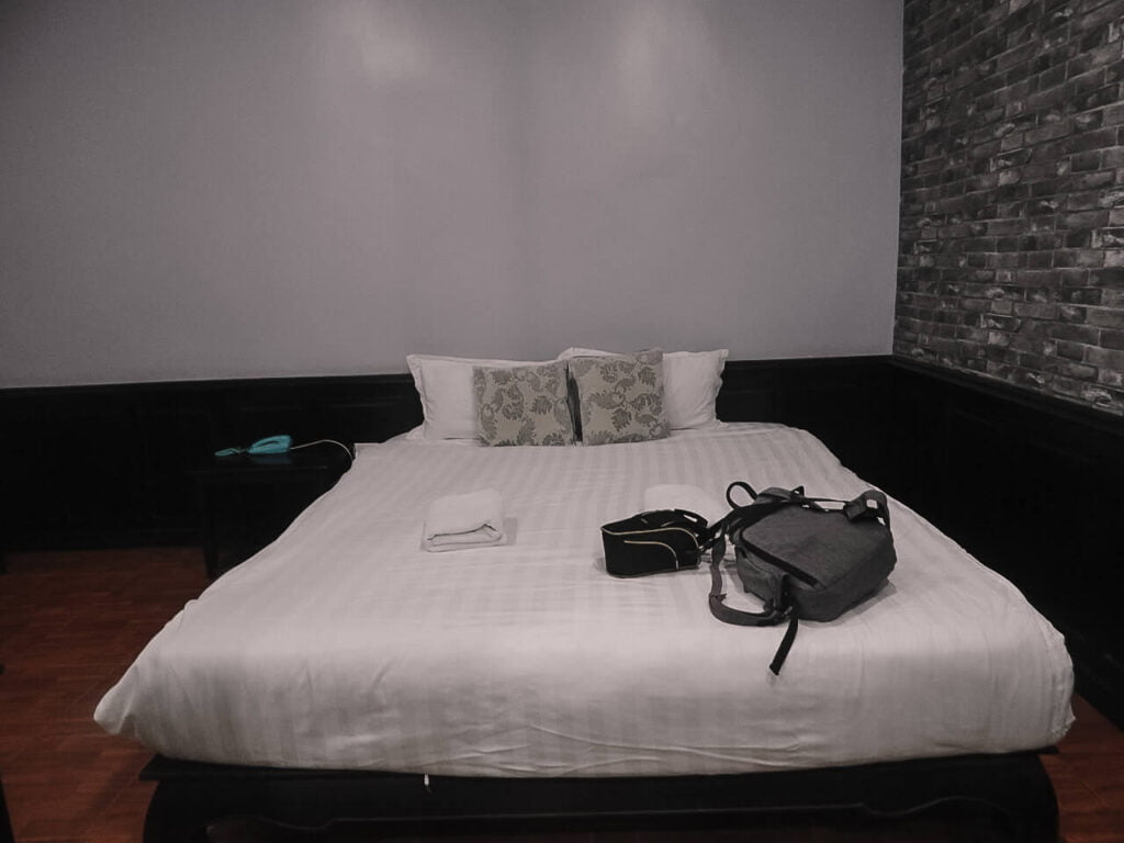 The queen-sized bed at the room.