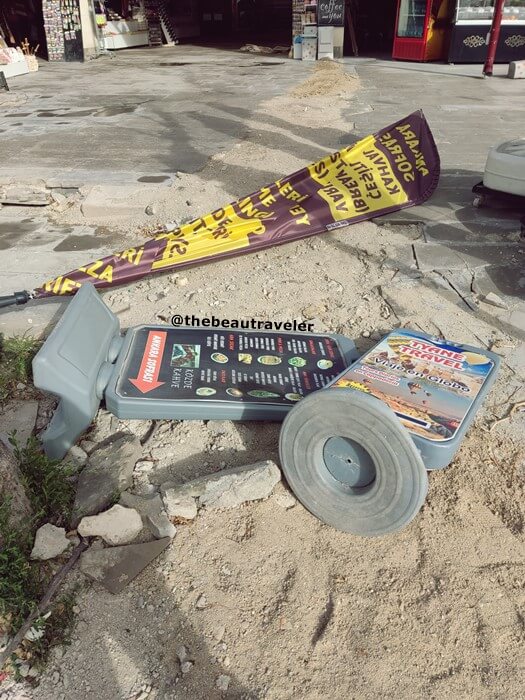 Restaurant banners and flyers fell down because of the strong wind.