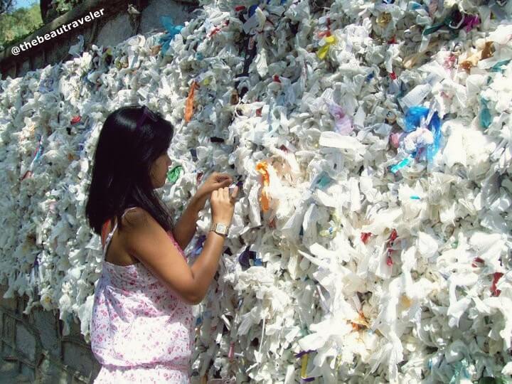 Me putting on my wishlist on the wishing wall at the House of the Virgin Mary in 2010.