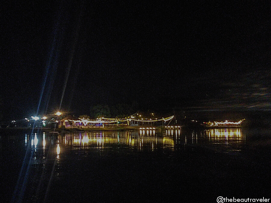 The night view from the balcony at Tara Raft Guesthouse in Kanchanaburi. 