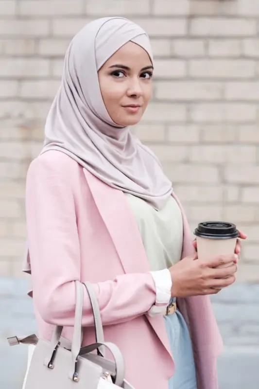 Modest fashion outfit with pink blazer and neutral hijab for everyday UK street style