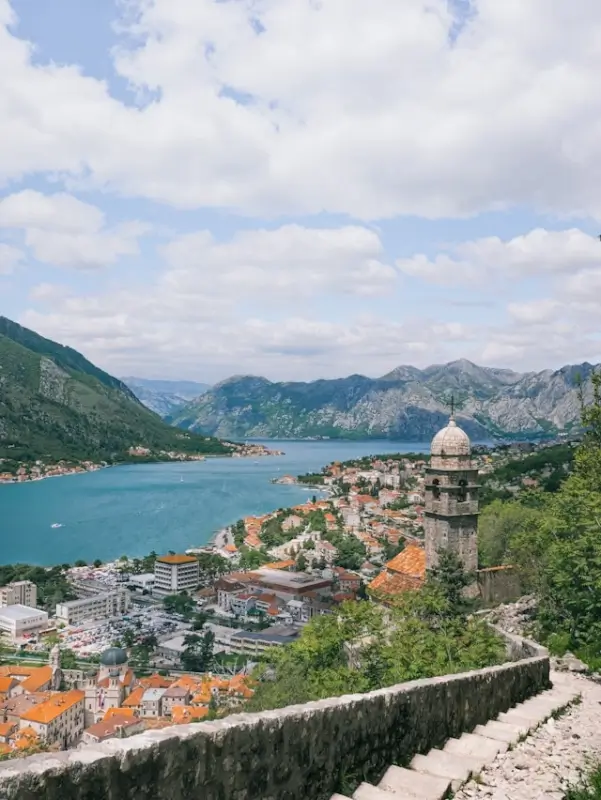 Panoramic view of Kotor old town Montenegro from ancient fortress walls with Bay of Kotor and surrounding mountains
