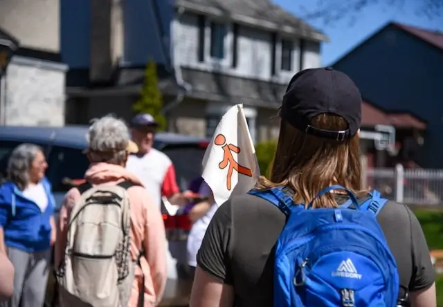 Free walking tour group exploring local neighborhoods for budget-friendly travel experiences