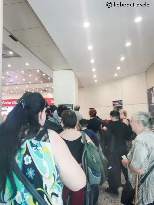 Crowded immigration queue at Sarpi border crossing with travelers waiting for Turkey-Georgia border control processing