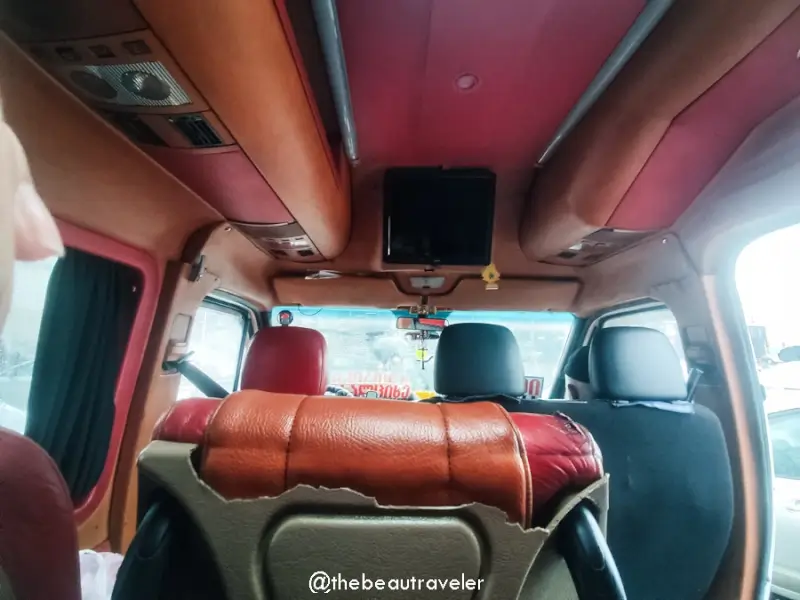 Interior of marshrutka minibus with leather seats and TV screen used for Georgia to Turkey border crossing transport