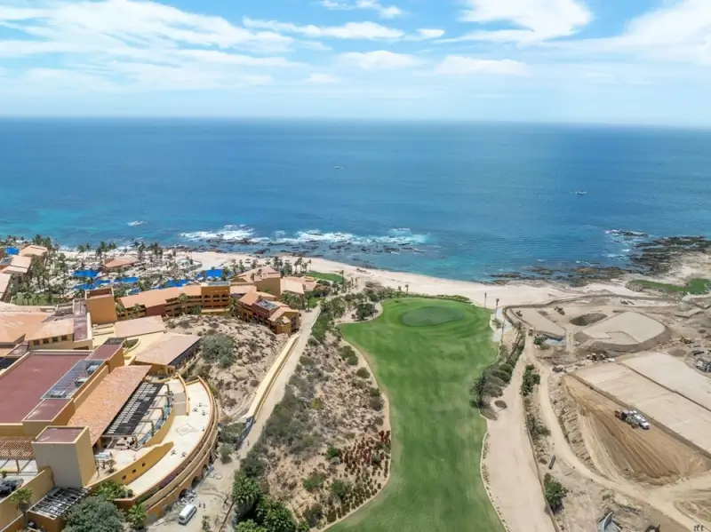 Aerial view of Palmilla Golf Club oceanfront course with luxury resort and Sea of Cortez in Los Cabos