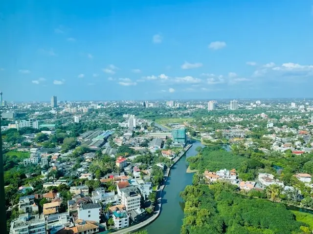 Aerial view of Colombo city skyline and neighborhoods where birthday brownie trend is popular among local families and bakeries
